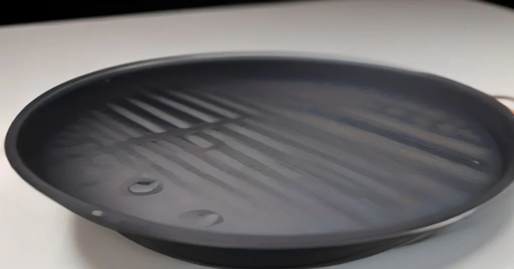 a Grill being cleaned